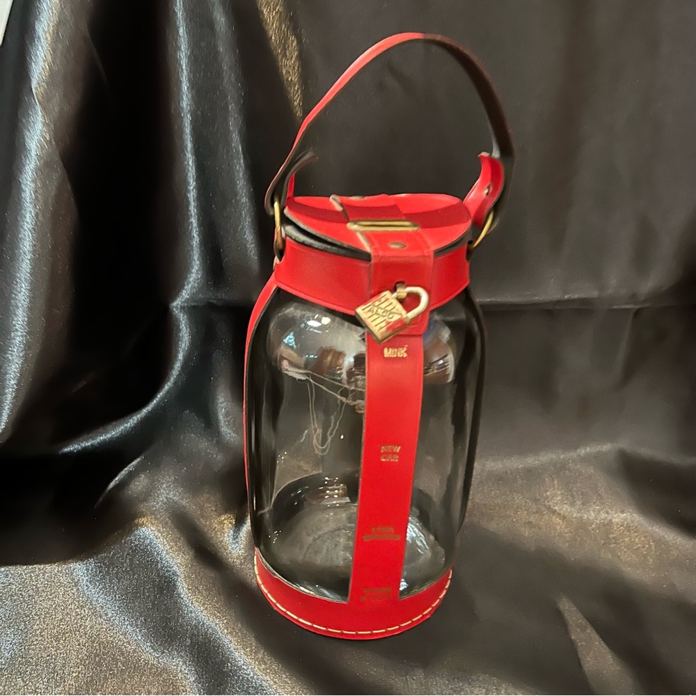 Vintage coin bank with leather trim and lock and key